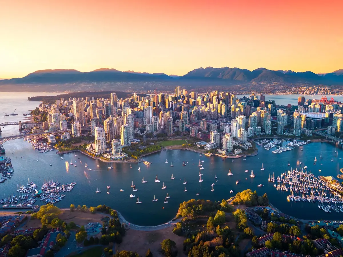 Aerial view of Coal Harbour marina and downtown Vancouver at sunset