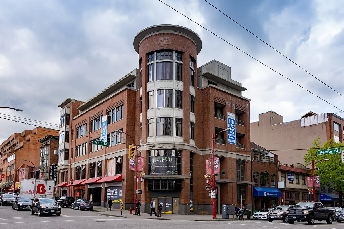 A corner retail building on Main Street in Vancouver