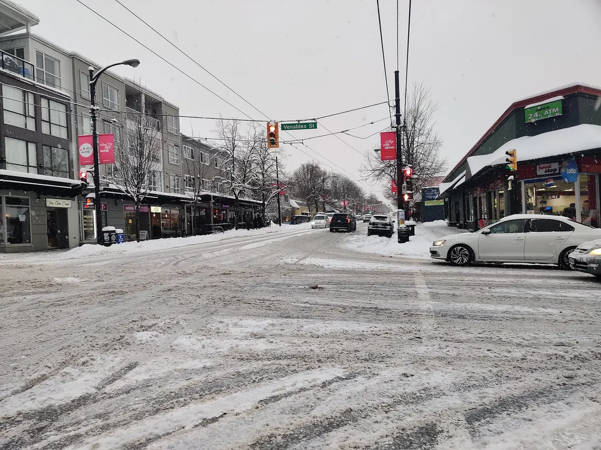 Storefronts along Commercial Drive in East Vancouver in the snow