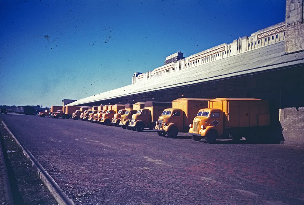 Trucks backed up to warehouse loading docks