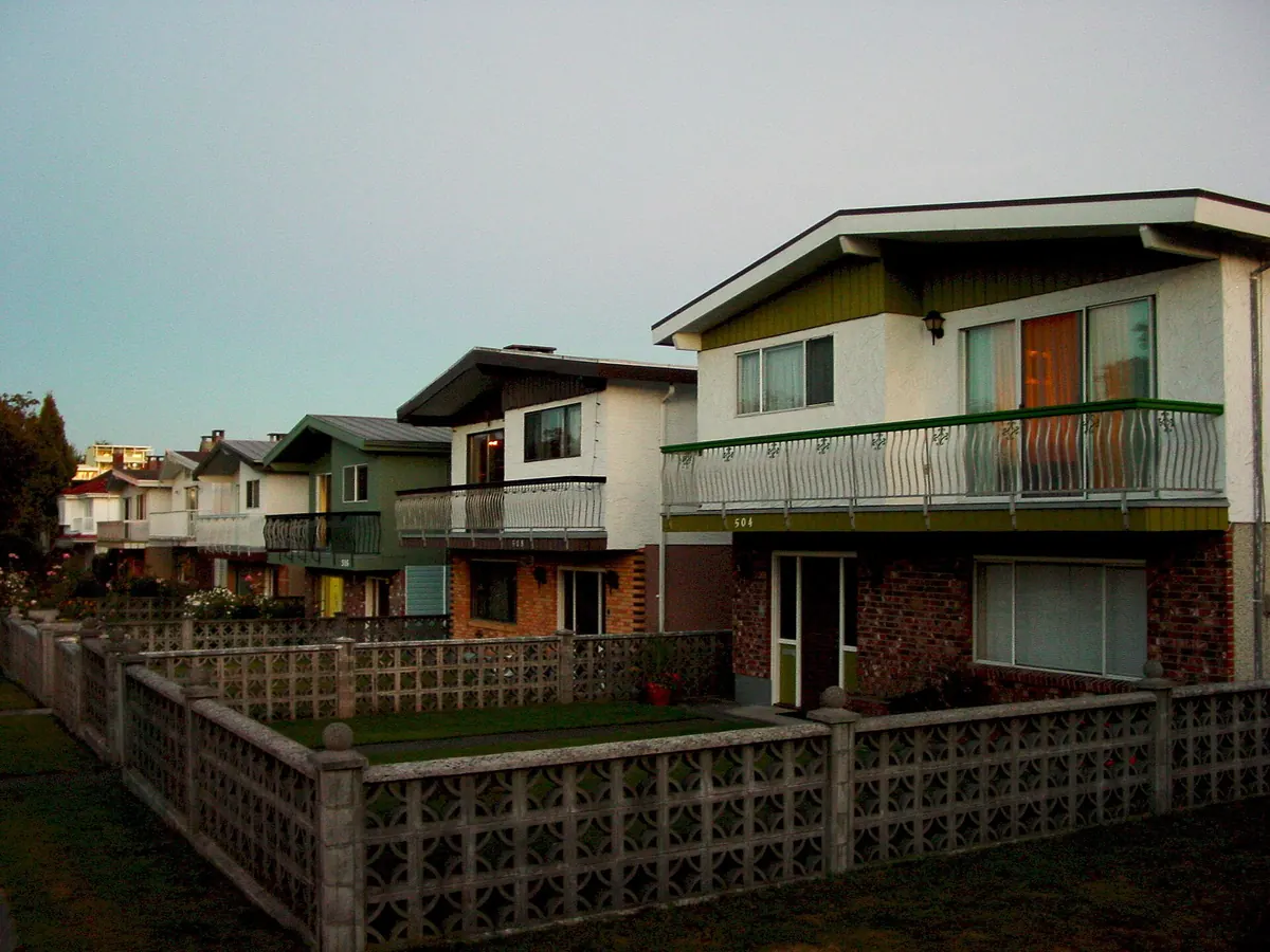 A Vancouver Special house on a residential street